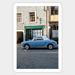 Classic car parked up in a quiet street in Norwich Sticker